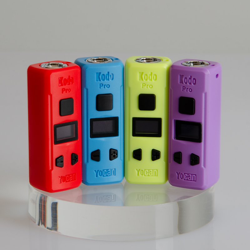 A group of colorful Yocan Kodo Pro Batteries on a table.